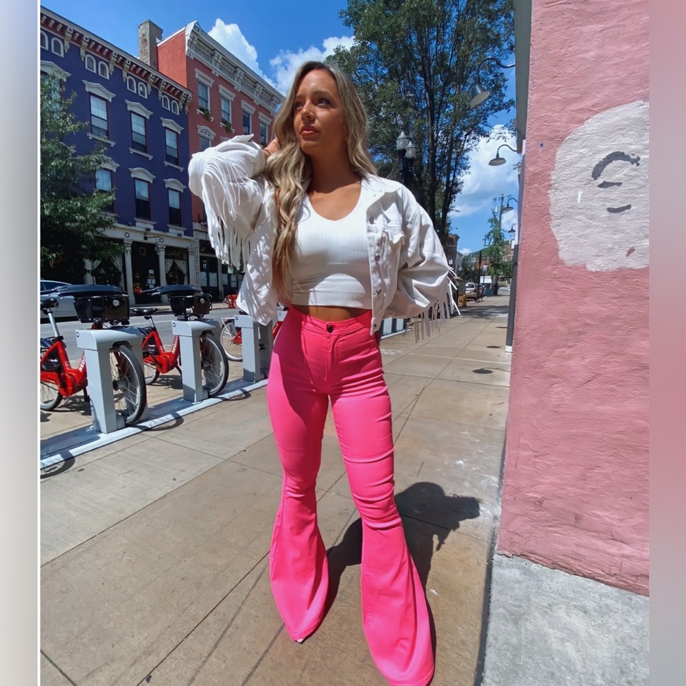 Size L, bell bottom hot pink jeans, NEW